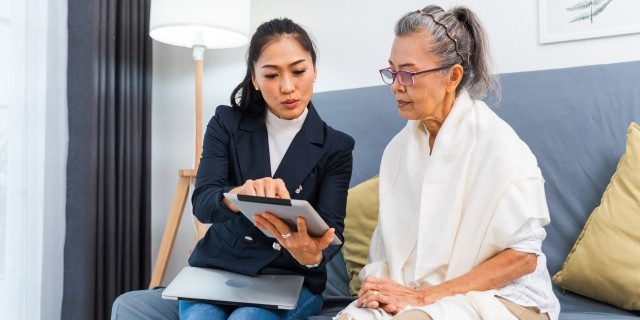 Two women discuss long term care insurance