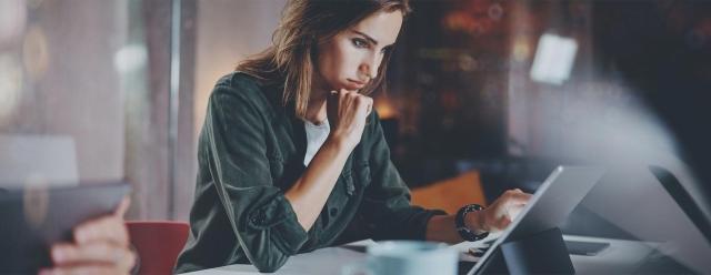 Female entrepreneur using marketing tools provided by World Financial Group.