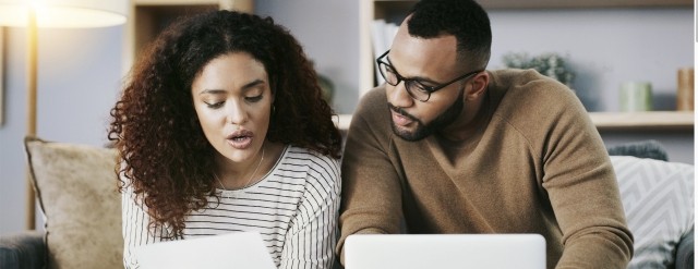 Couple learning more about financial education